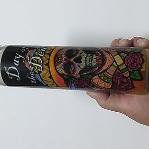 Hand poured white candles from Mexico Halloween themed. 8 inches tall.